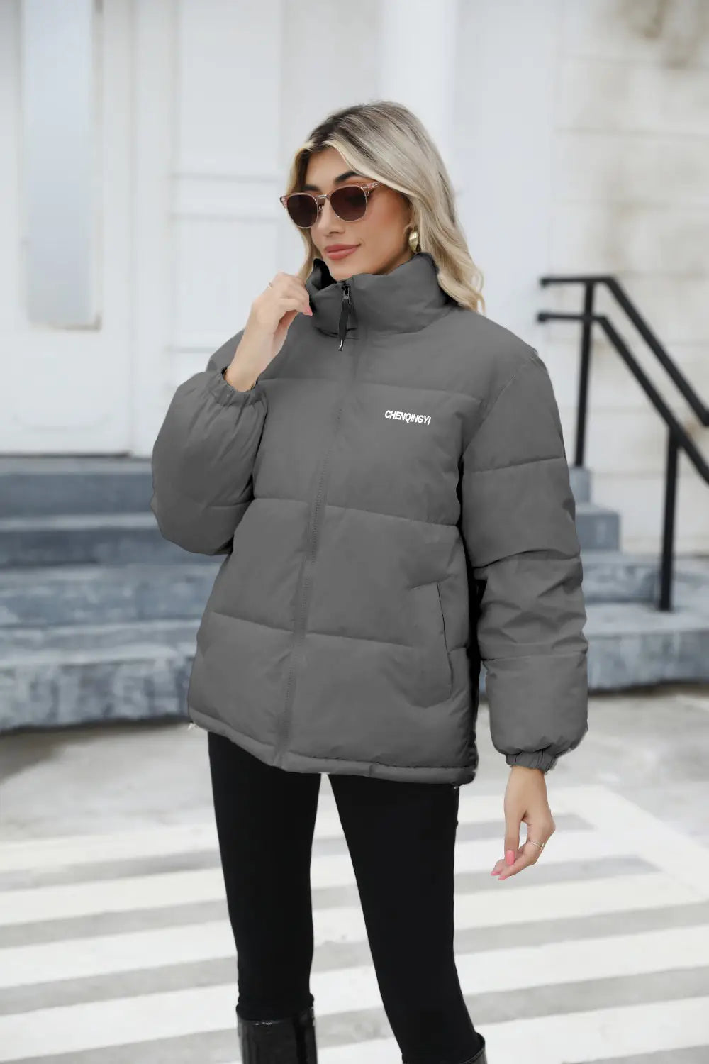 Gray women casual windproof puffer winter coat with a high collar quilted design and obey logo embroidered in white on the left chest.