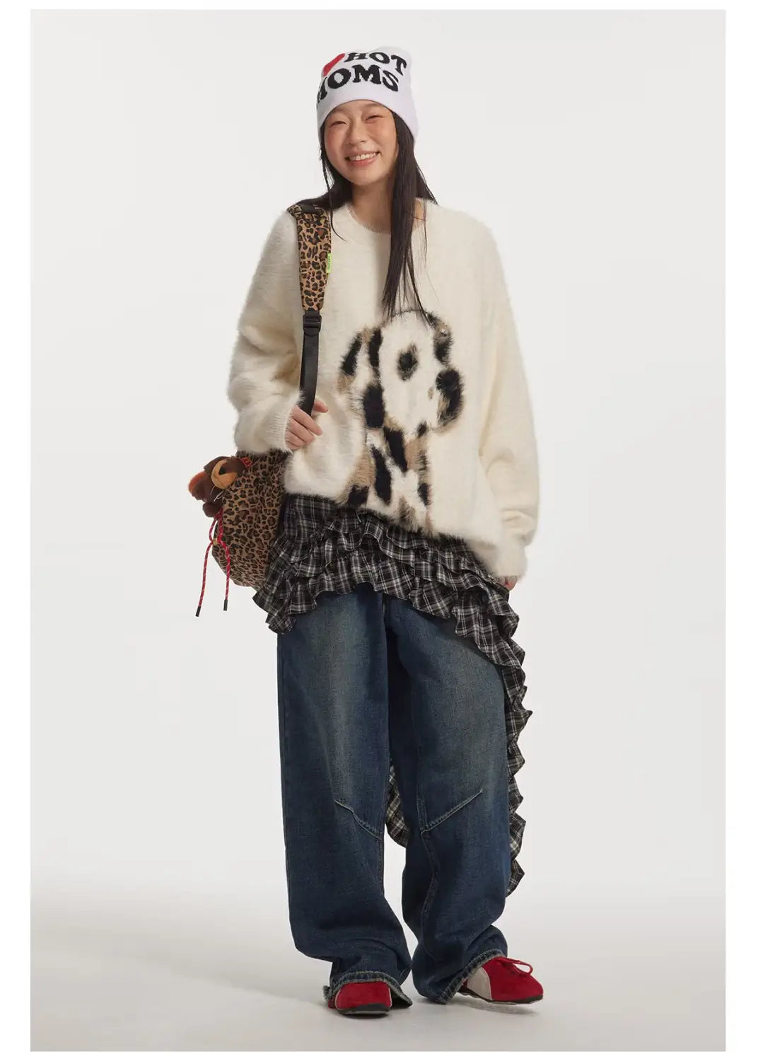 cream-colored fuzzy sweater featuring a black and white dalmatian puppy jacquard mink pattern made from jacquard mink cashmere knitted fabric