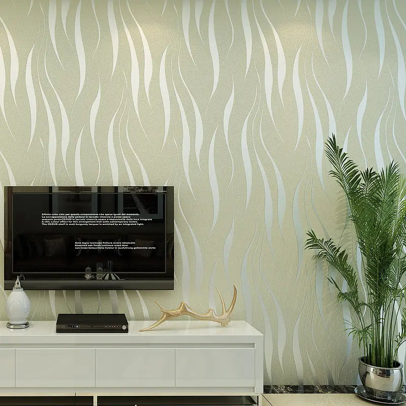 A sleek black flat-screen television mounted on a wall decorated with beige and white wavy water ripple non woven wallpaper suitable for luxury women’s fashion interiors.