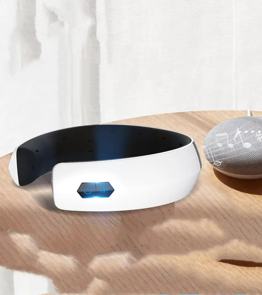 White and black electronic cervical spine integrated massage device with a glowing blue control panel for effective spine integrated massage therapy.