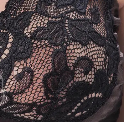 black lace bra with intricate floral patterns and sheer mesh overlay featured in a plus size european bodysuit stretch nightdress in maroon satin for elegant nightwear