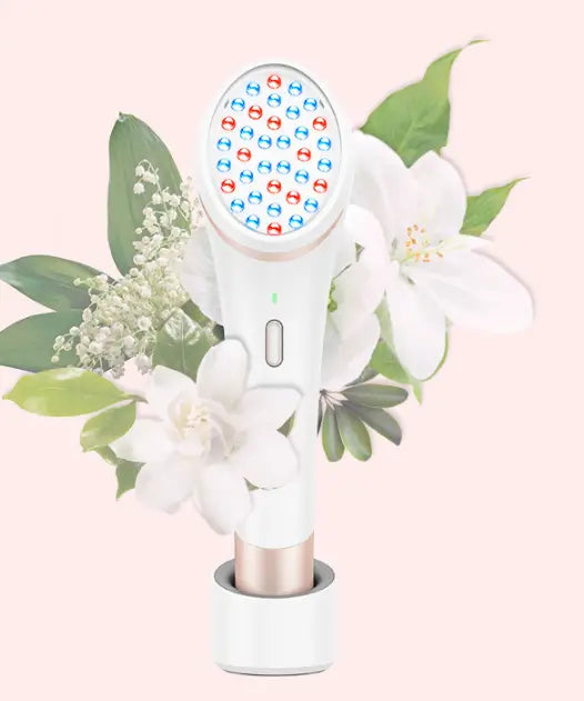 White and rose gold Xpreen wireless blue light acne therapy device with a circular head featuring red and blue lights arranged in a grid pattern for light therapy treatment.