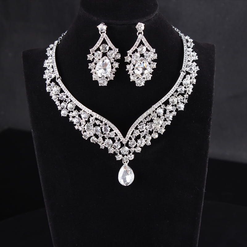 A sparkling silver-toned alloy diamond accessories floral crystal jewelry set featuring a teardrop pendant necklace and matching earrings with intricate crystal detailing.