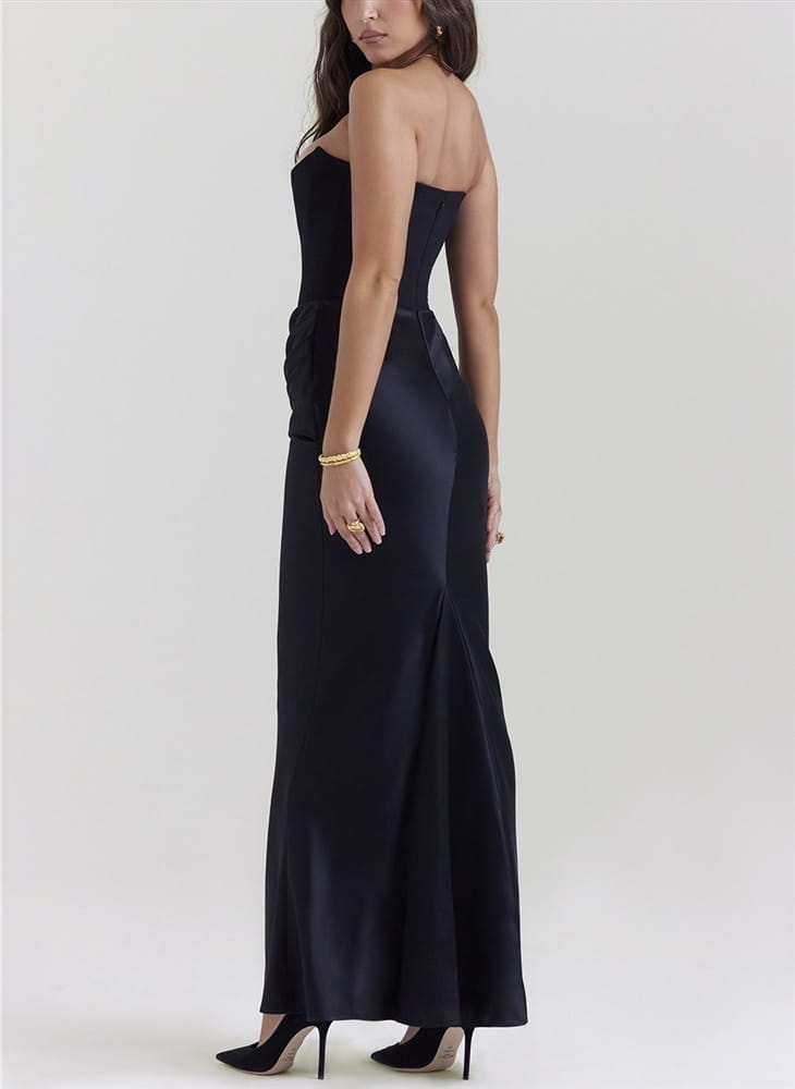 A sleek strapless black satin long dress sexy fashion bandeau gown with a fitted bodice and flowing skirt.