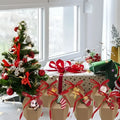 Red ribbon-tied paper christmas gift boxes with cards cartoon santa in festive holiday decoration set 24 pcs christmas gift