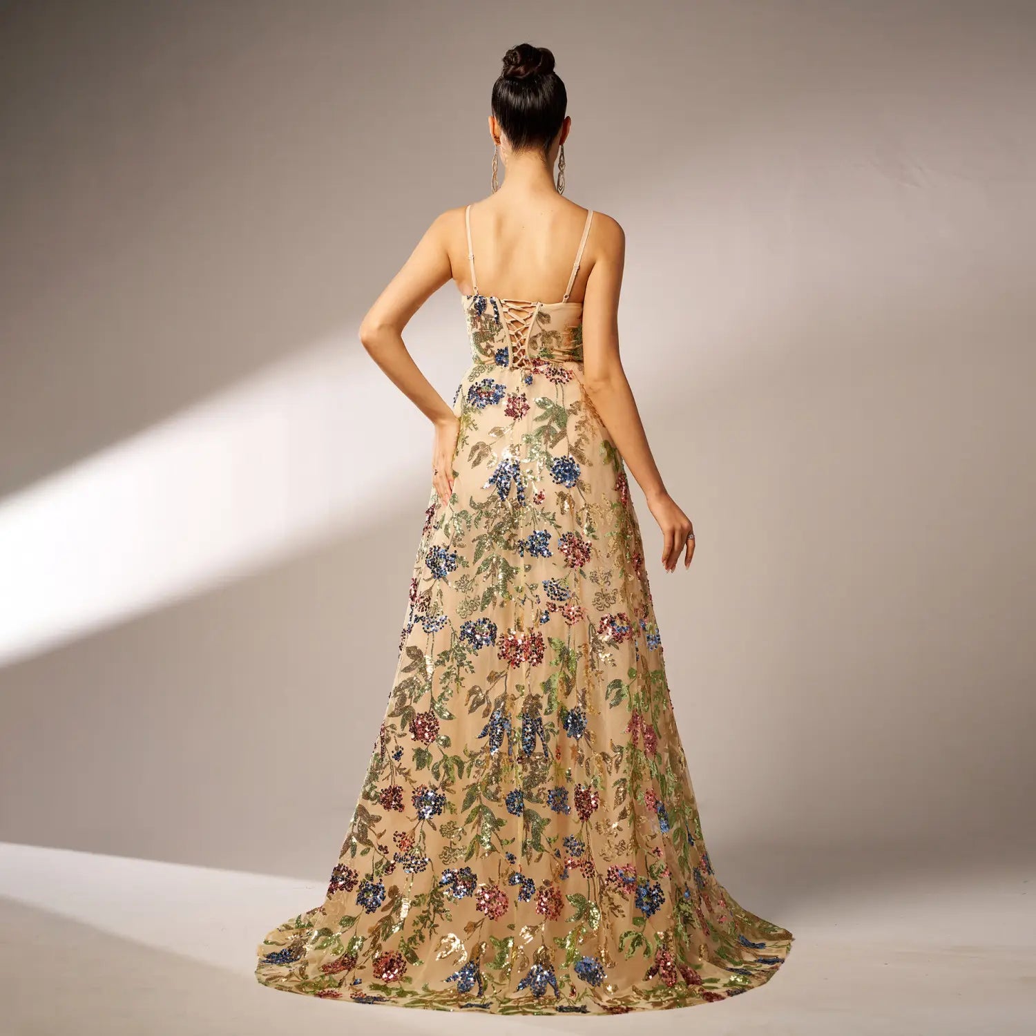 beige floral elegant sleeveless sequined gown with delicate spaghetti straps and back lace-up detail for a sleeveless sequined suspender evening look