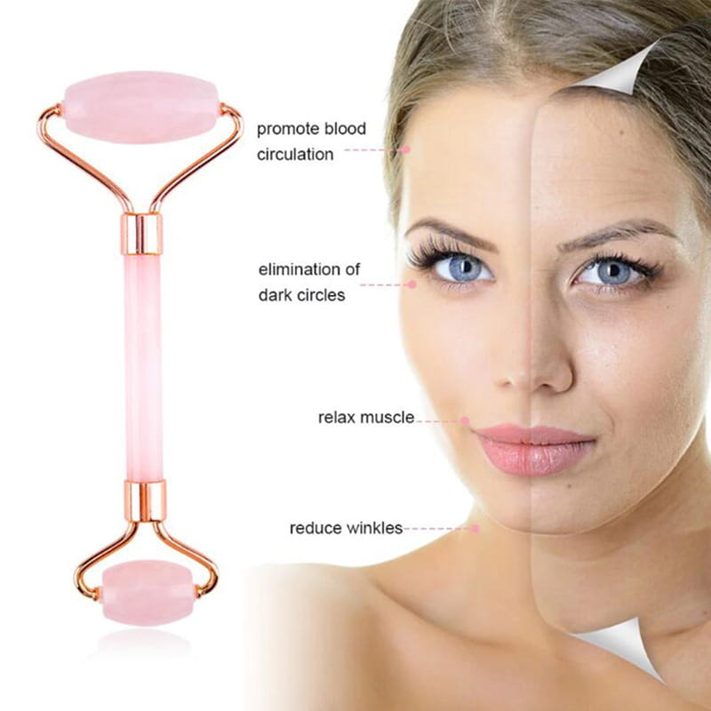 Rose quartz facial roller with rose gold metal frame used as a wrinkle remover gua sha tool for facial massage and skin care.
