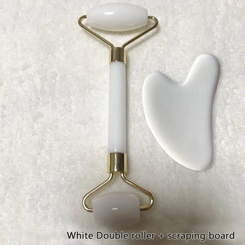 rose quartz facial roller featuring white double rollers with a gold-toned metal frame and smooth translucent jade-like rollers designed as an effective wrinkle remover gua sha tool.