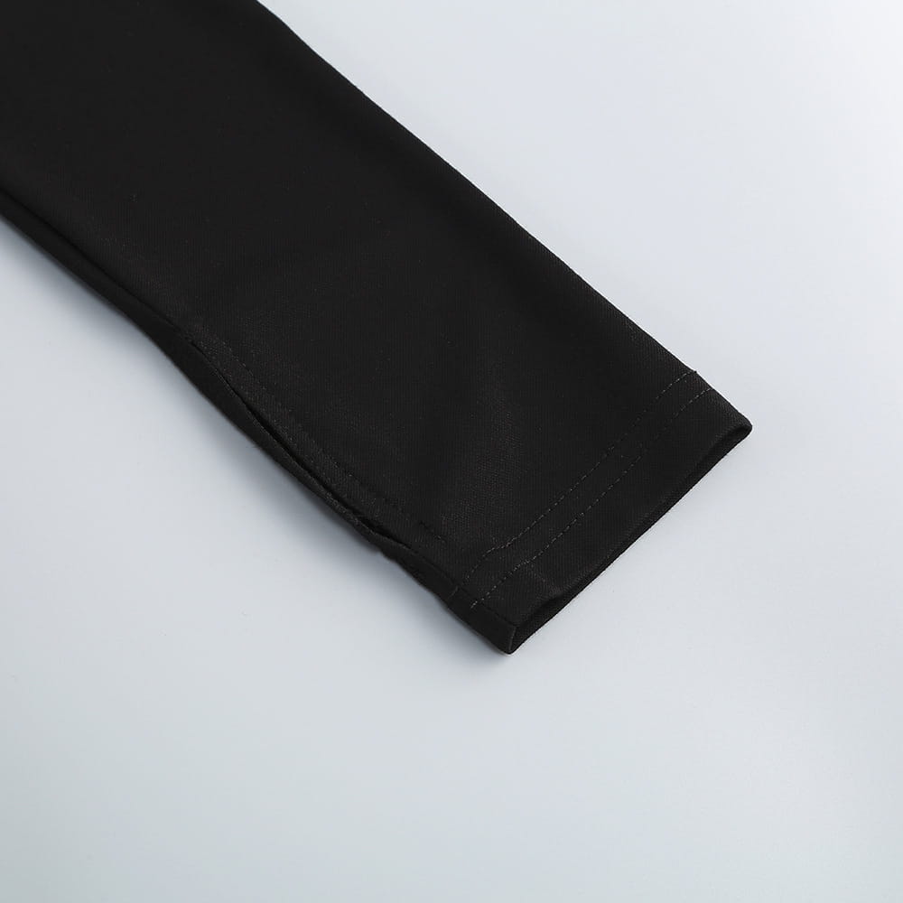 black fabric sleeve with neat stitching along the cuff of a backless long sleeves skirt showcasing elegant sleeves skirt waist design