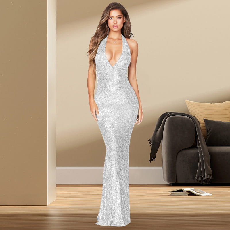 A shimmering silver sequined halter backless dress with a deep v halter neckline and fitted silhouette, ideal as a black sequined deep v halter backless dress for elegant occasions.