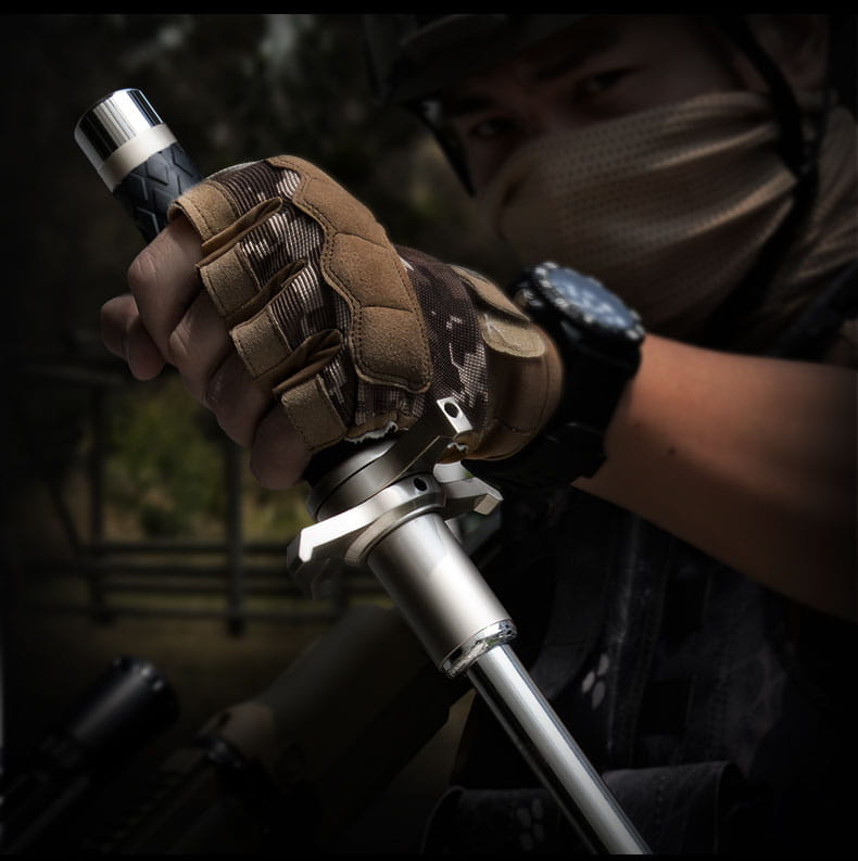 A telescopic self-defense anti-cut stick with a silver metallic tactical flashlight and black textured grip held firmly in a camouflage-patterned glove by Royale Essence Lux.