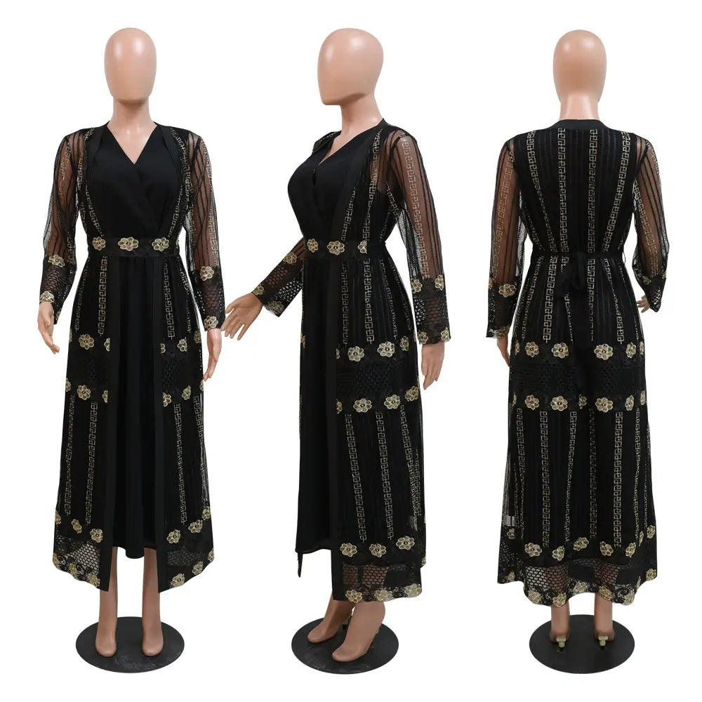 Black long-sleeved vest dress kraft with gold floral and geometric embroidery on sheer mesh panels in a teal gold embroidered vest dress kraft abaya.