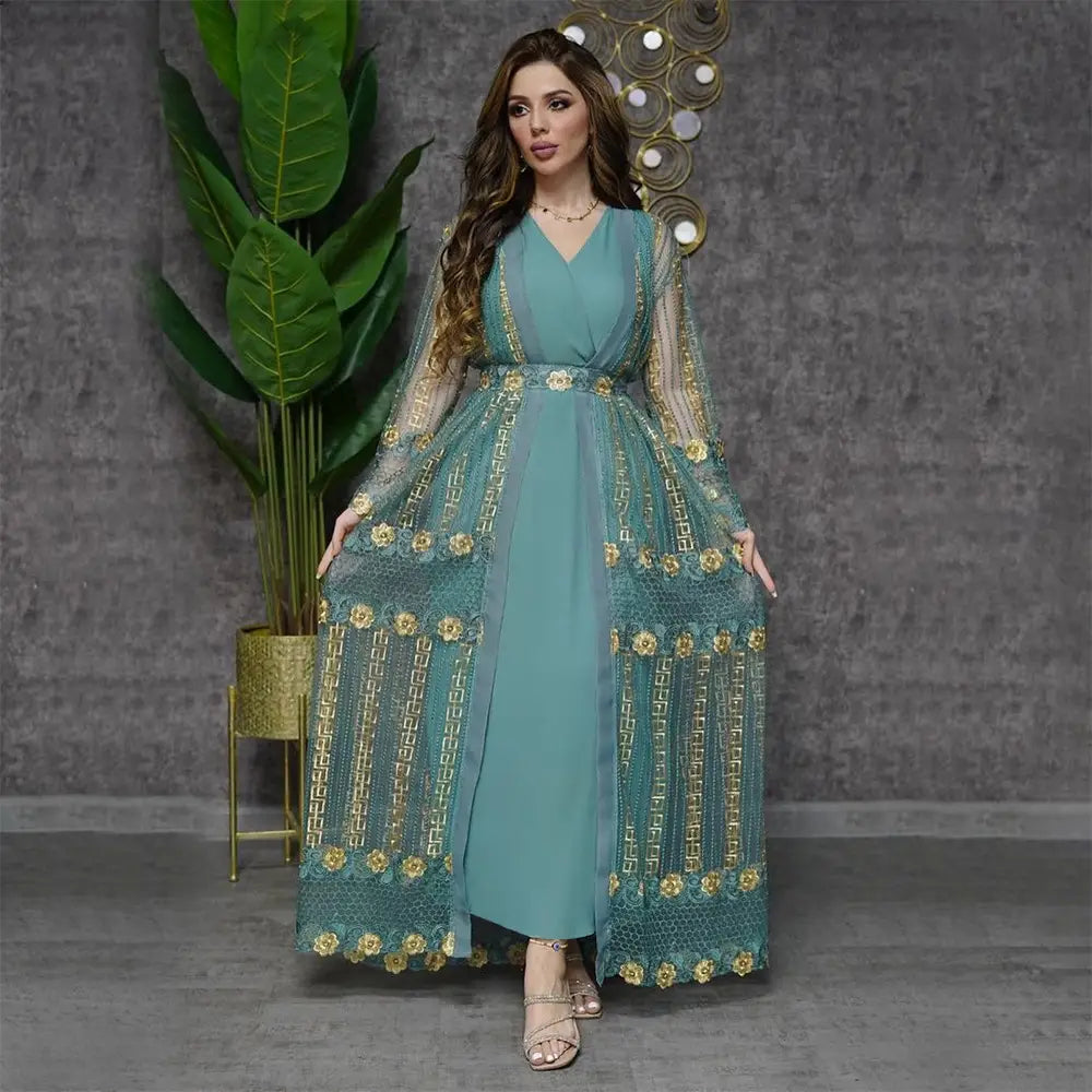 Teal long-sleeved vest dress kraft abaya featuring gold floral and geometric embroidery in an elegant design.