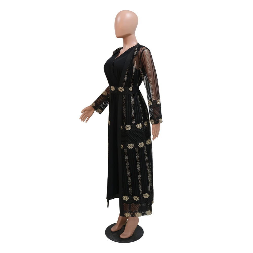 Black vest dress kraft with gold floral and geometric embroidery on sheer mesh panels in teal gold embroidered vest dress kraft abaya style.