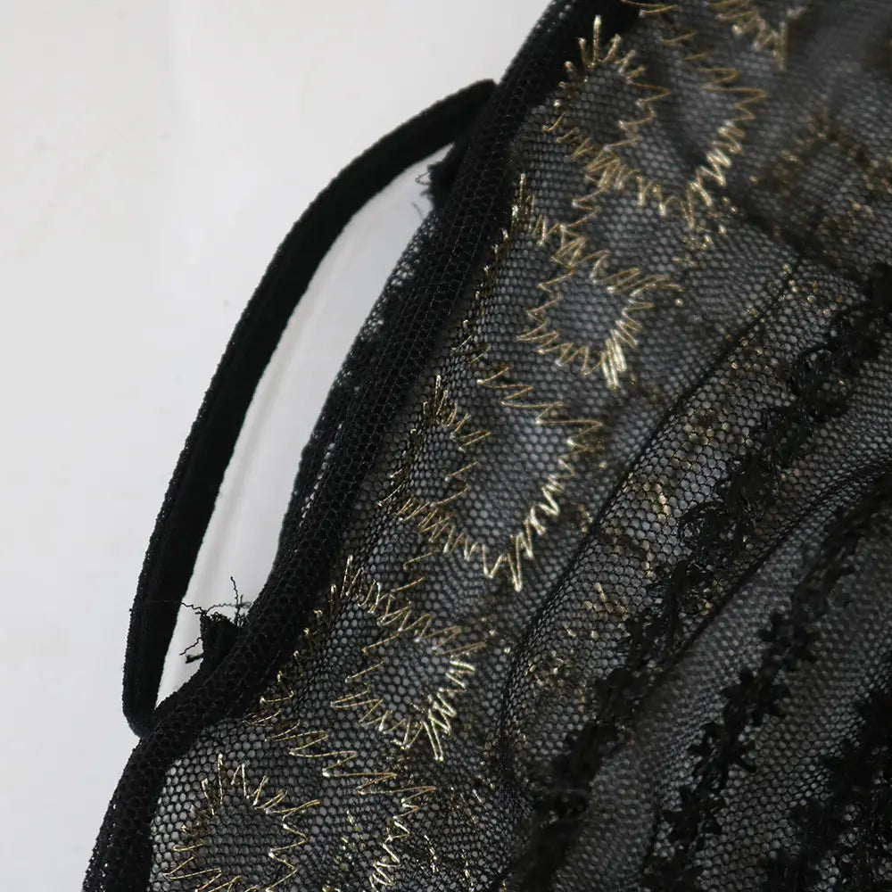 black lace vest dress kraft with intricate gold thread embroidery and matching black strap in a teal gold embroidered design
