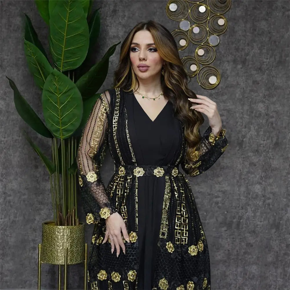 black vest dress kraft featuring gold floral and geometric embroidery with sheer long sleeves in a luxurious and elegant design