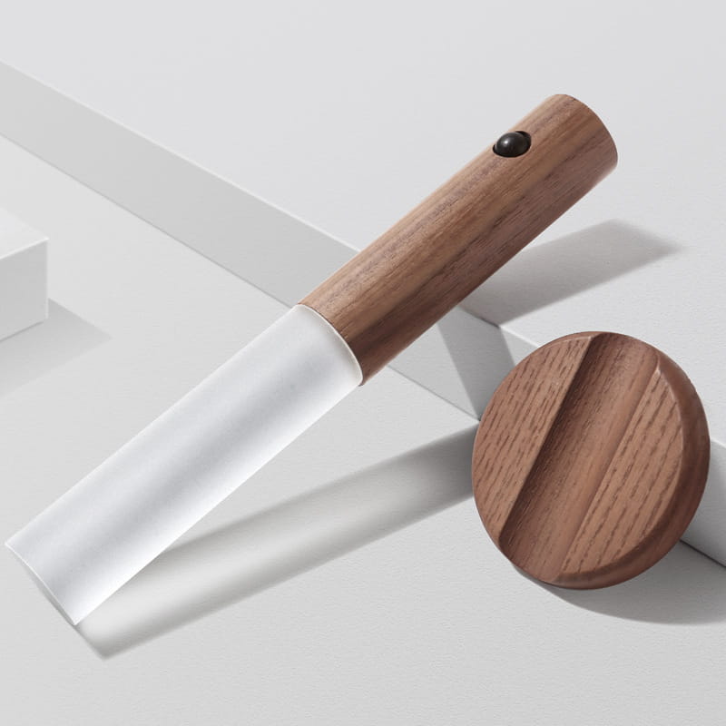 Wooden LED desk lamp sconce with frosted glass features a wooden-handled garden trowel with a translucent white plastic blade and a matching wooden circular base.