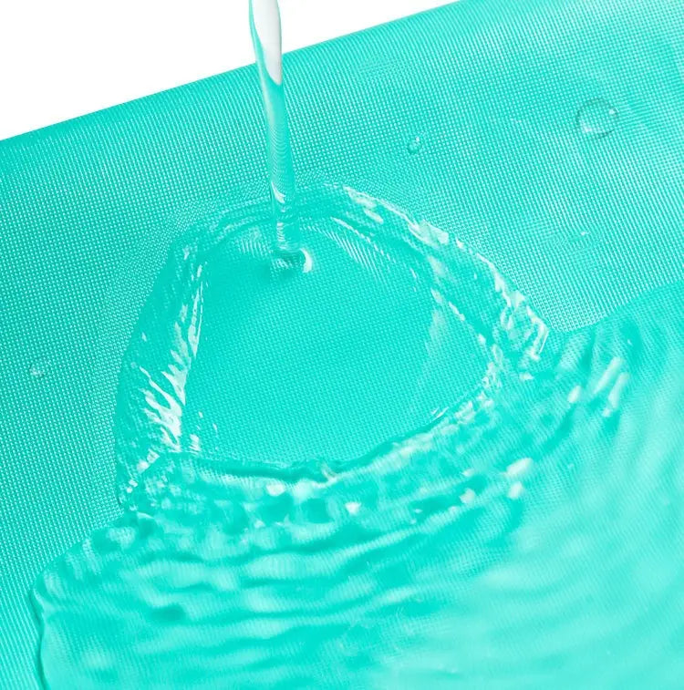 teal-colored textured fabric surface of an air conditioner waterproof cover demonstrating water resistance for cleaning tools suit use