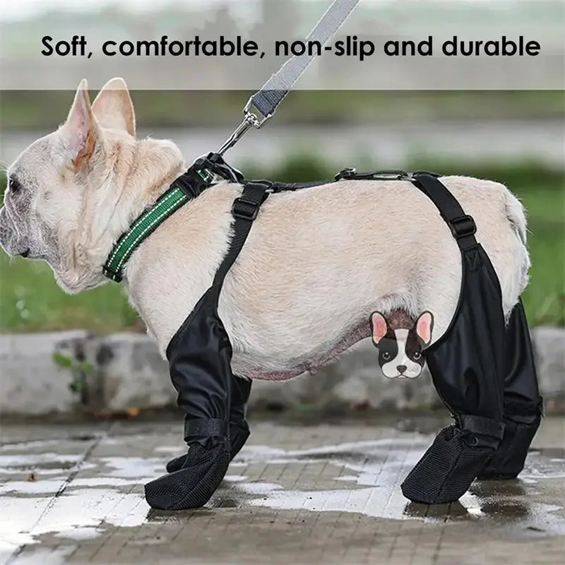 Black waterproof adjustable dog shoes featuring a cute cartoon puppy face design on the side made from durable material for outdoor use.
