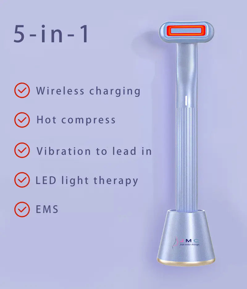 Silver-toned 5-in-1 360 degrees rotary eye massage wand with a sleek cylindrical body and red-accented top head featuring therapeutic warmth for enhanced facial care.