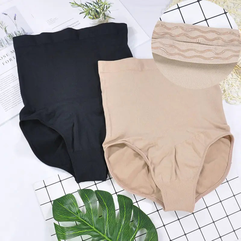 Beige and black lace high waisted ladies triangle seamless bodysuit panties with a subtle wavy lace trim and seamless waist design.