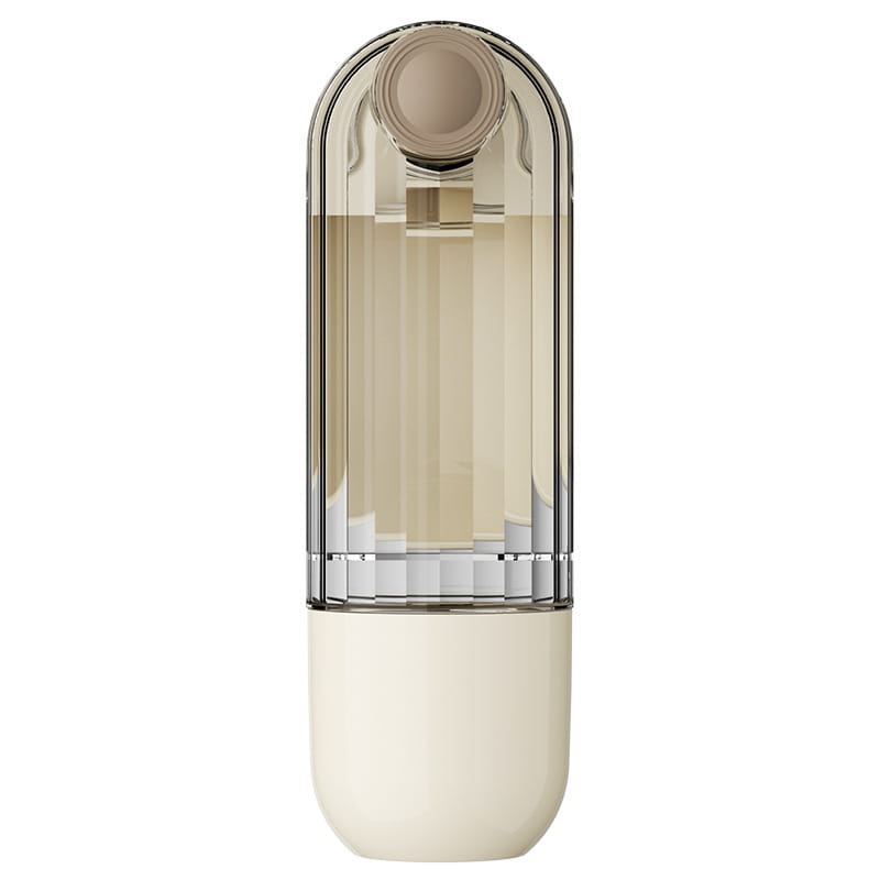 A sleek modern portable green dog walking pet water cup with a transparent upper section showing amber liquid and a matte cream base designed for the water cup segment.