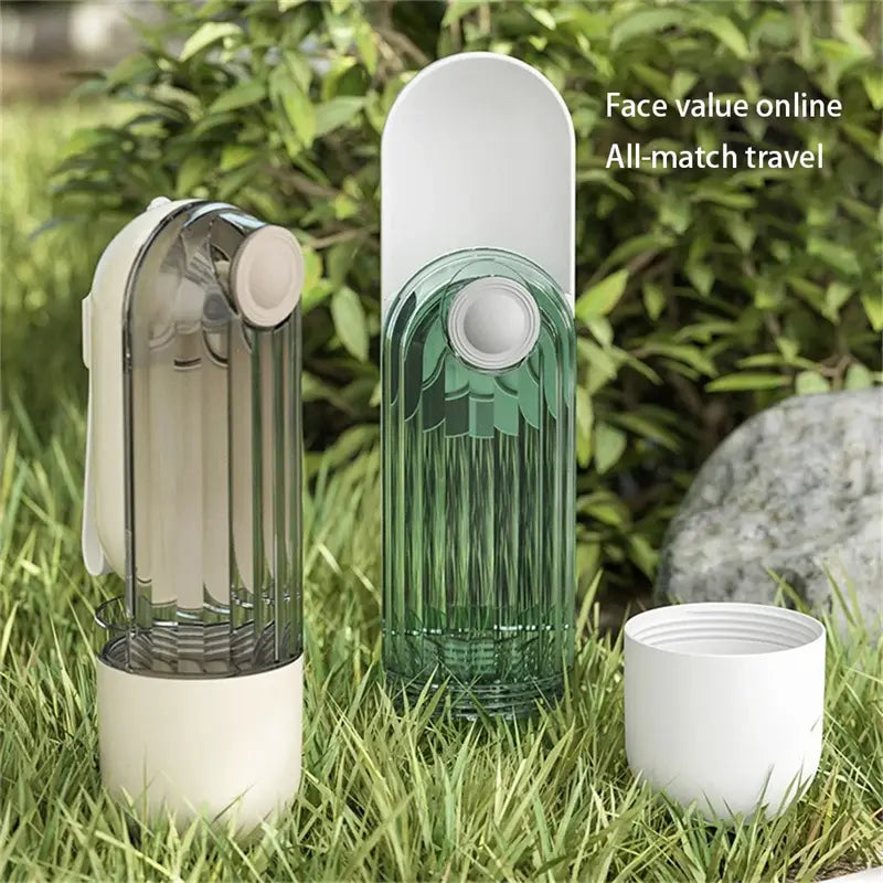 Two translucent portable green dog walking pet water cups with white caps and bases, one in dark green with vertical ridges and leaf-like patterns, designed for convenient use in the water cup segment.