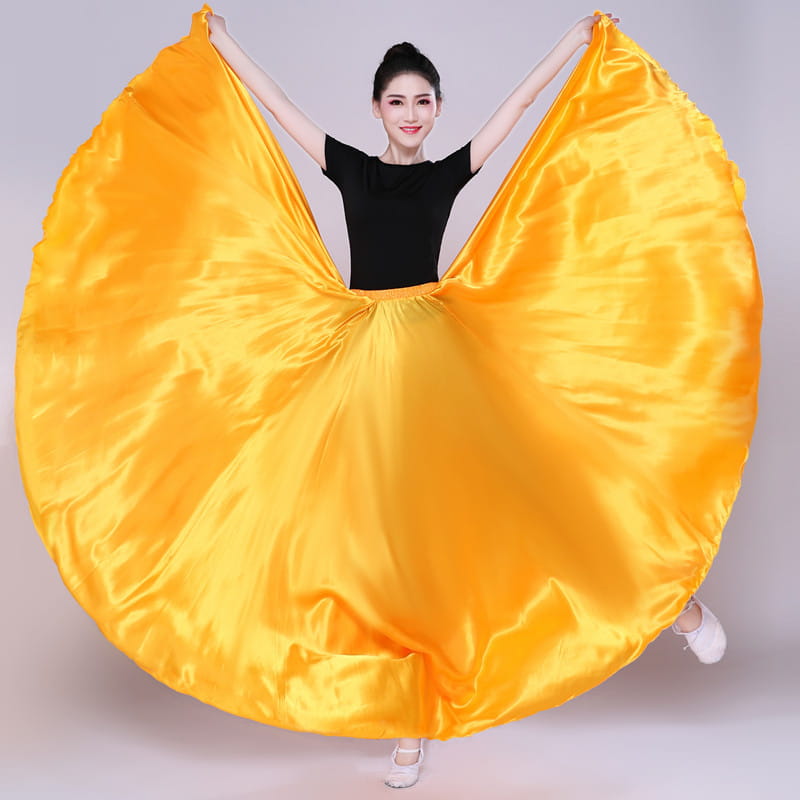 vibrant yellow satin solid color performance skirt with a flowing circular design for color performance use