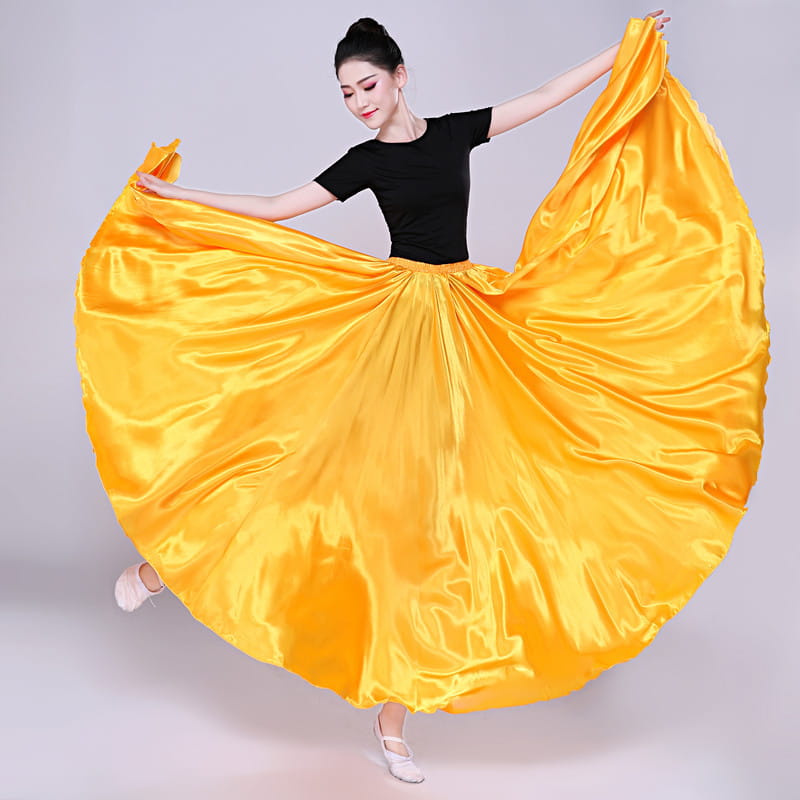 vibrant yellow satin solid color performance skirt with a flowing full silhouette and elastic waistband designed for dance and color performance use