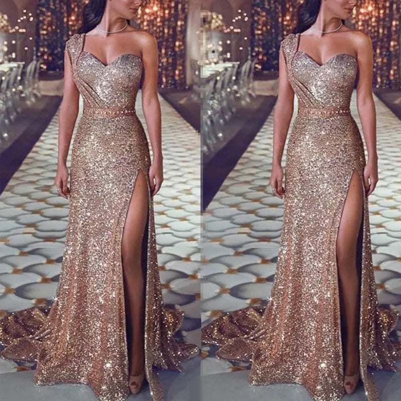 a shimmering rose gold sleeveless bronzing split evening gown with a one shoulder design and fitted silhouette featuring a high slit