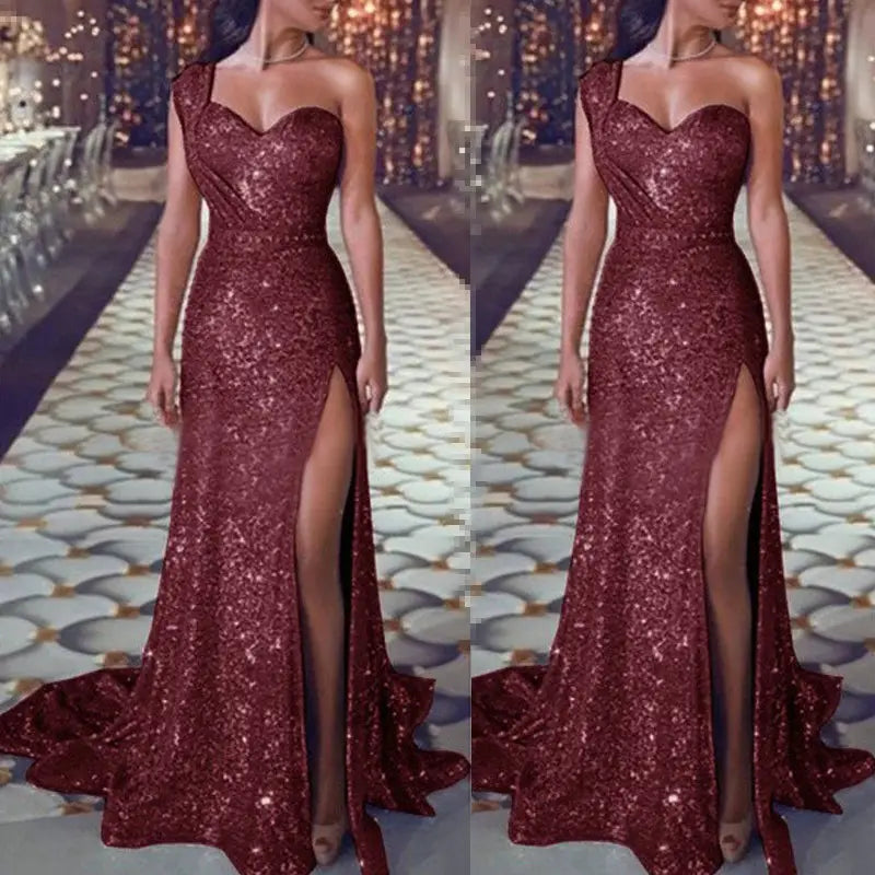 a shimmering burgundy sequined one shoulder sleeveless bronzing split dress with a high slit designed for evening wear