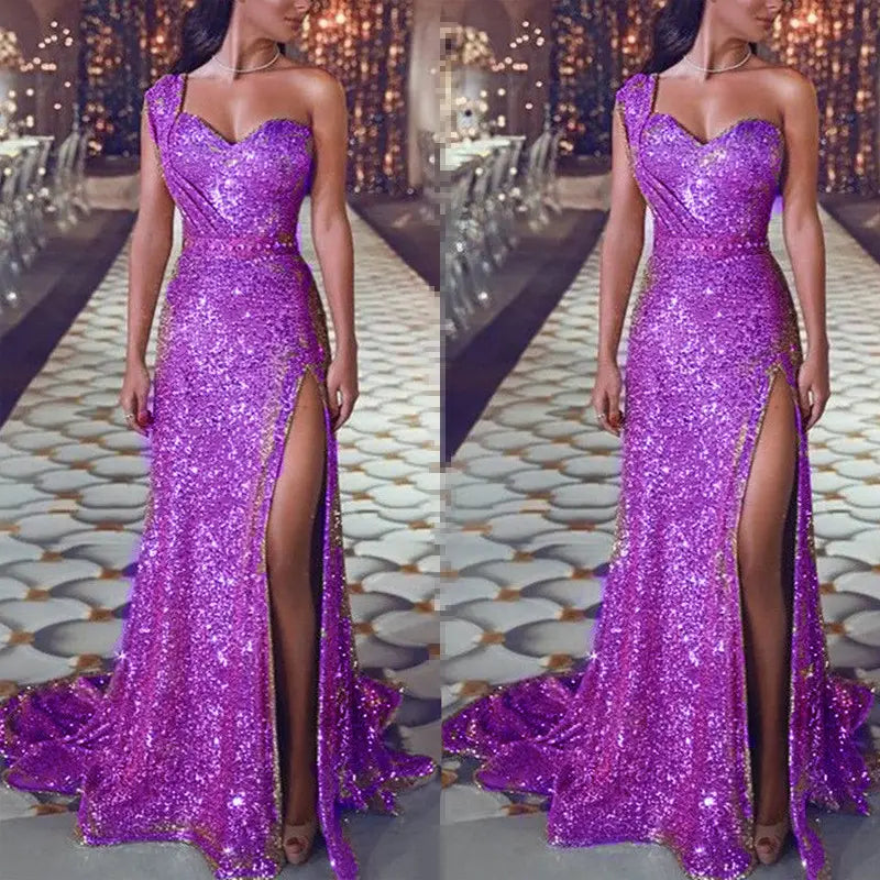 a shimmering purple sequined one shoulder sleeveless bronzing split dress with a high slit and gold trim along the sides