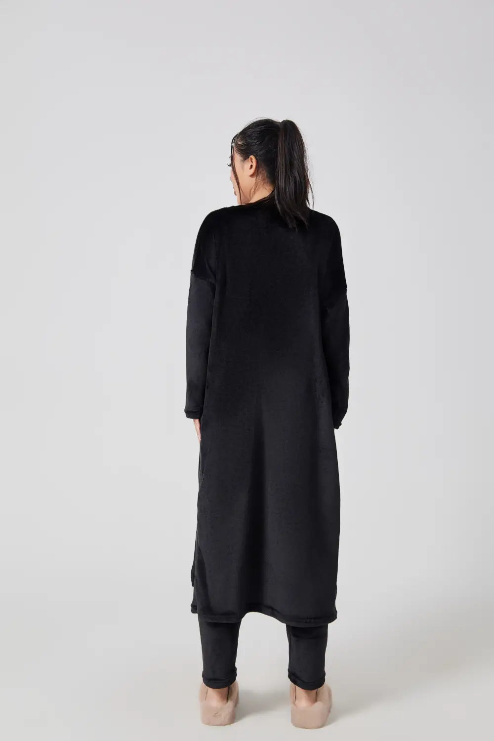 black long-sleeved loose-fitting maxi dress with high neckline and slightly flared hem, part of the blue shimmer 3 piece lounge set designed for a cozy pajama set experience.