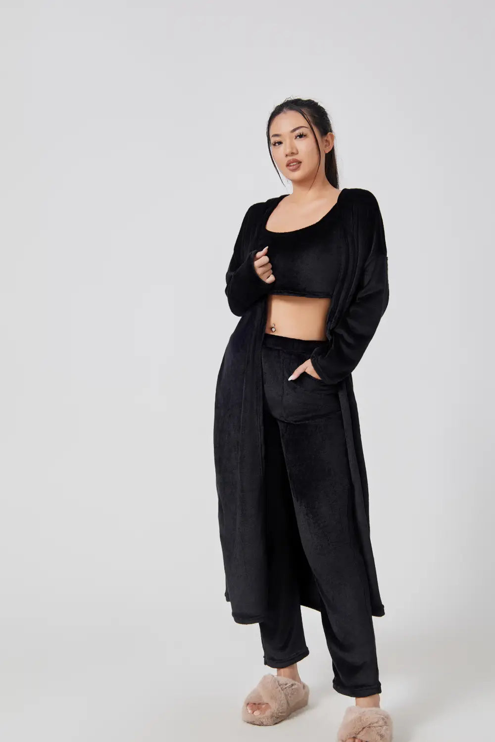 black velvet longline cardigan with square neckline and full-length sleeves as part of a cozy pajama set lounge set