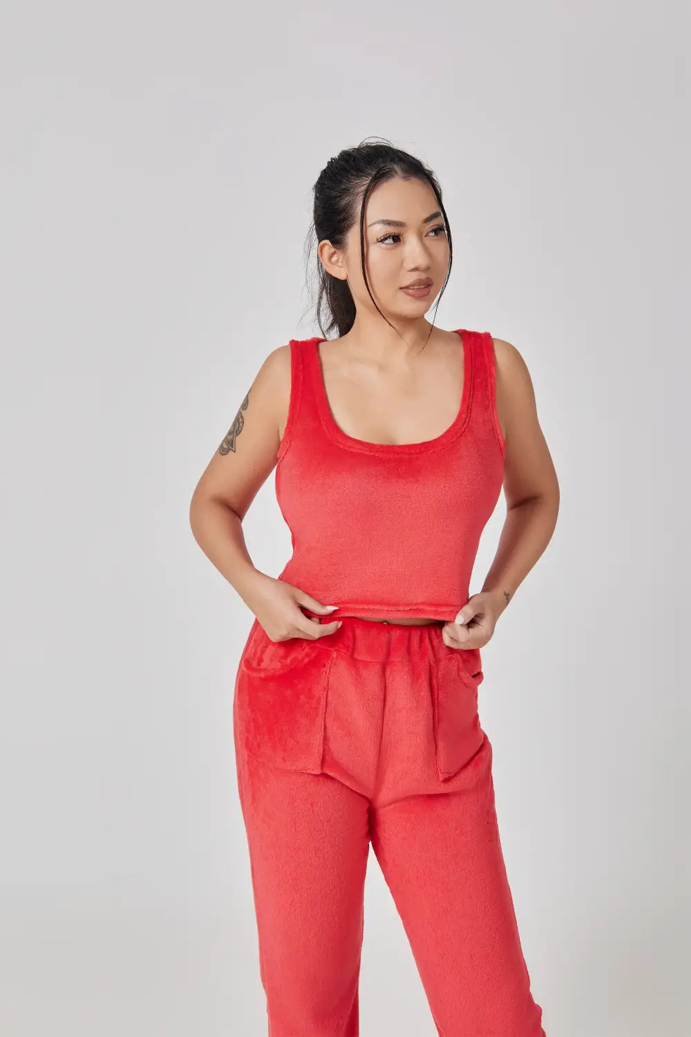 red sleeveless top with square neckline and elastic waistband as part of a cozy pajama set lounge set in blue shimmer three piece lounge set collection
