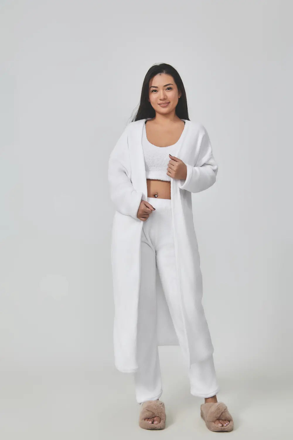 white long-sleeved loose-fitting cardigan with a soft textured knit fabric as part of the blue shimmer cozy pajama set lounge set