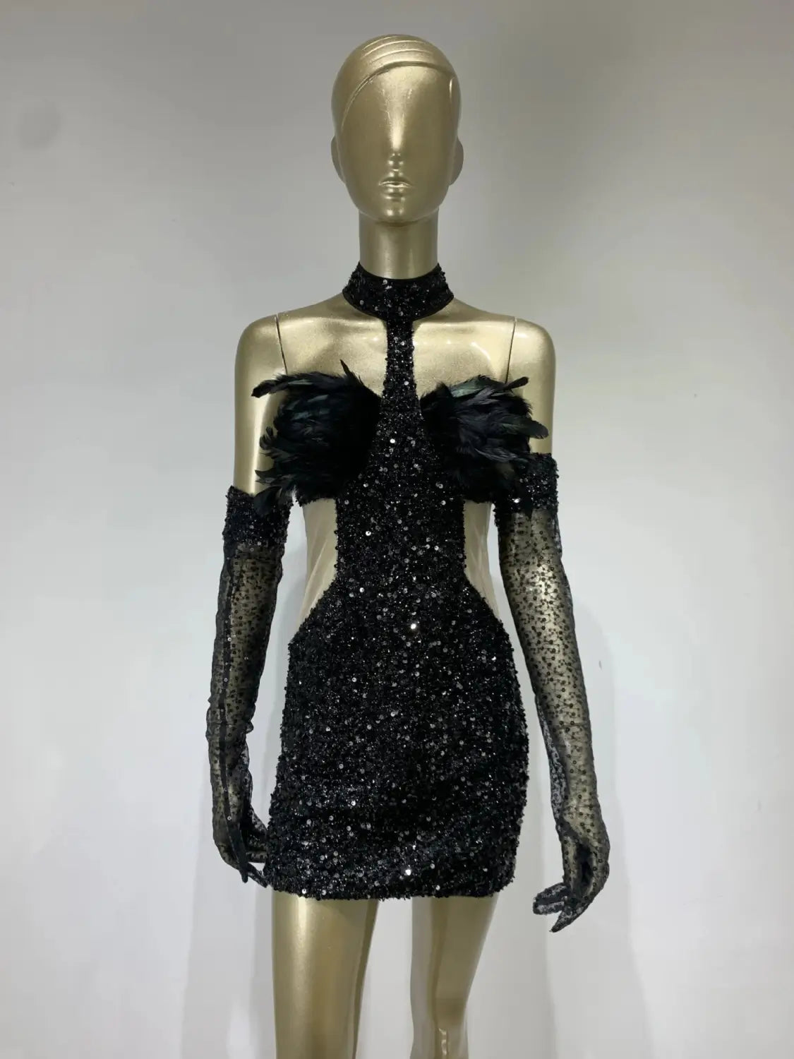 black halter feather sequins short mini dress featuring black sequined fabric with feathered shoulder accents and sheer mesh gloves for elegant evening wear
