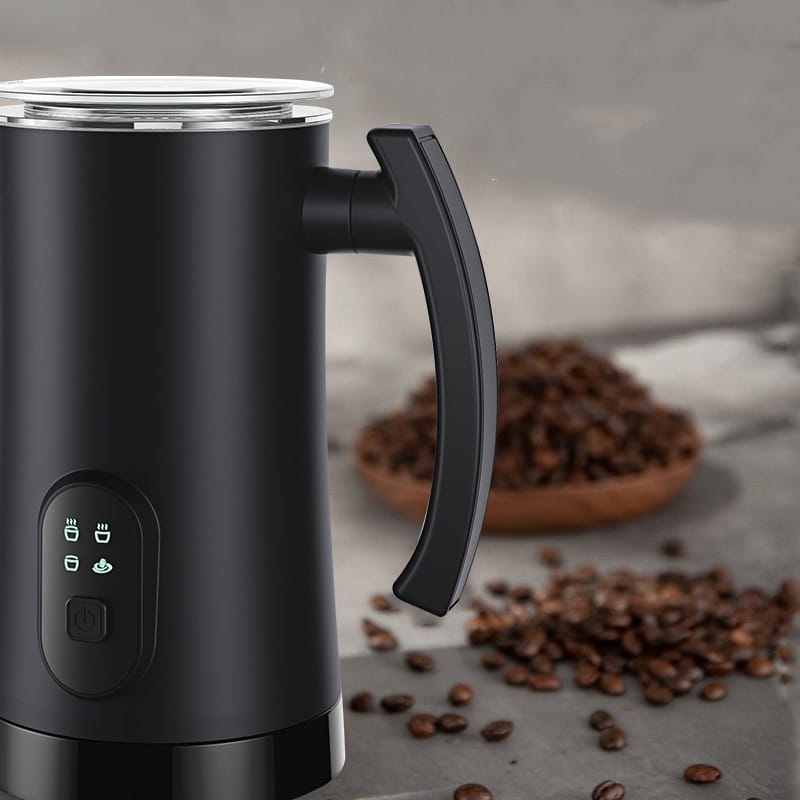 Black stainless steel electric milk frother with a sleek matte finish and silver lid designed as a whipping machine.