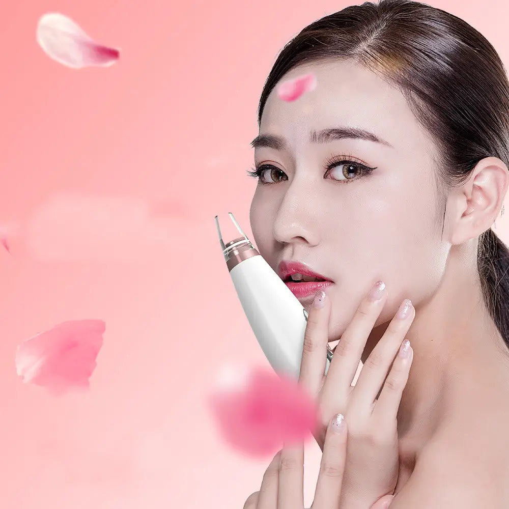 White and rose gold electric pores clean artifact nose vacuum with sleek modern design for household cosmetic use