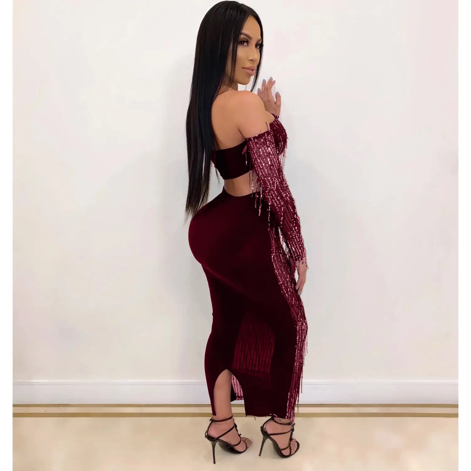 a shimmering burgundy off-the-shoulder dress featuring mesh sequins tassel sleeves and fringe detailing, perfect for fashion sexy occasions.