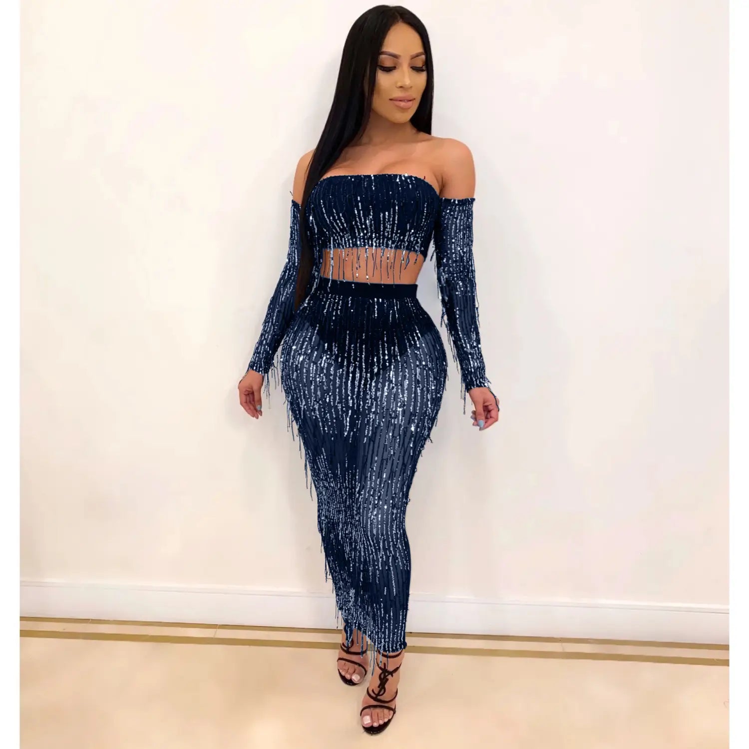 A shimmering navy blue mesh sequins tassel two-piece set featuring a strapless crop top and high-waisted leggings with long flowing fringe details for a fashion sexy look.