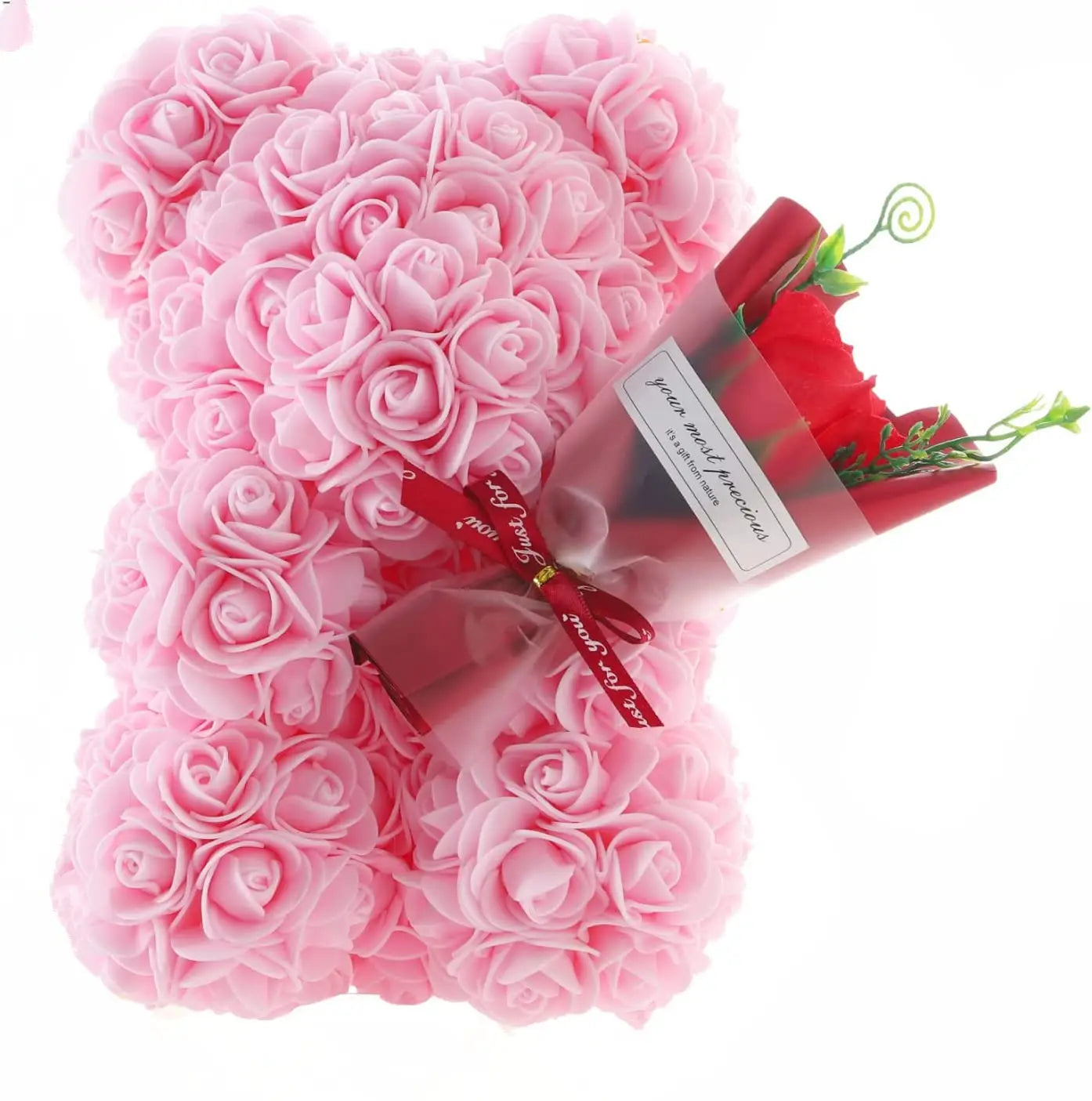 A soft pink preserved rose flower gift box featuring a foam rose bear intricately crafted with hundreds of delicate petals in a cuddly teddy shape.