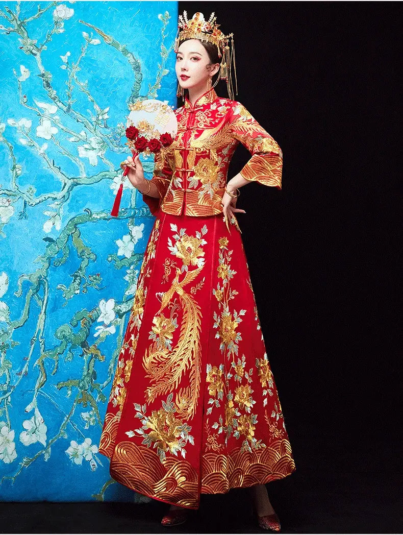 A vibrant red official robes xiuhe wedding dress featuring intricate golden phoenix and floral embroidery with a high collar, fitted bodice, and flowing skirt inspired by chinese dragon motifs.