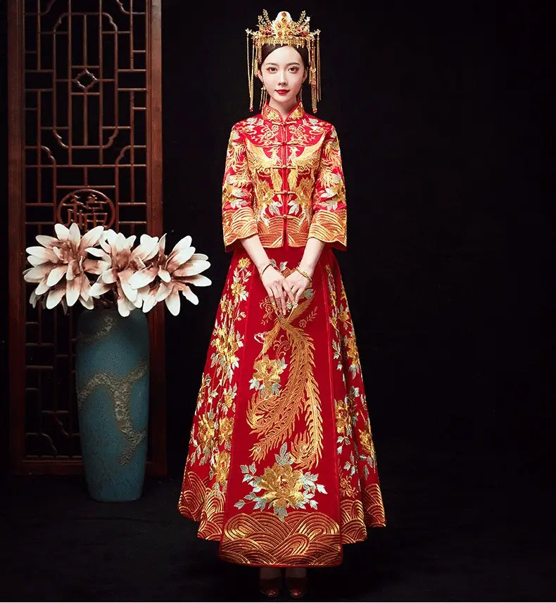 A woman wears a vibrant red official robes xiuhe dress featuring intricate golden phoenix embroidery and floral patterns with an ornate gold headdress in a traditional chinese dragon and phoenix robes xiuhe dress.