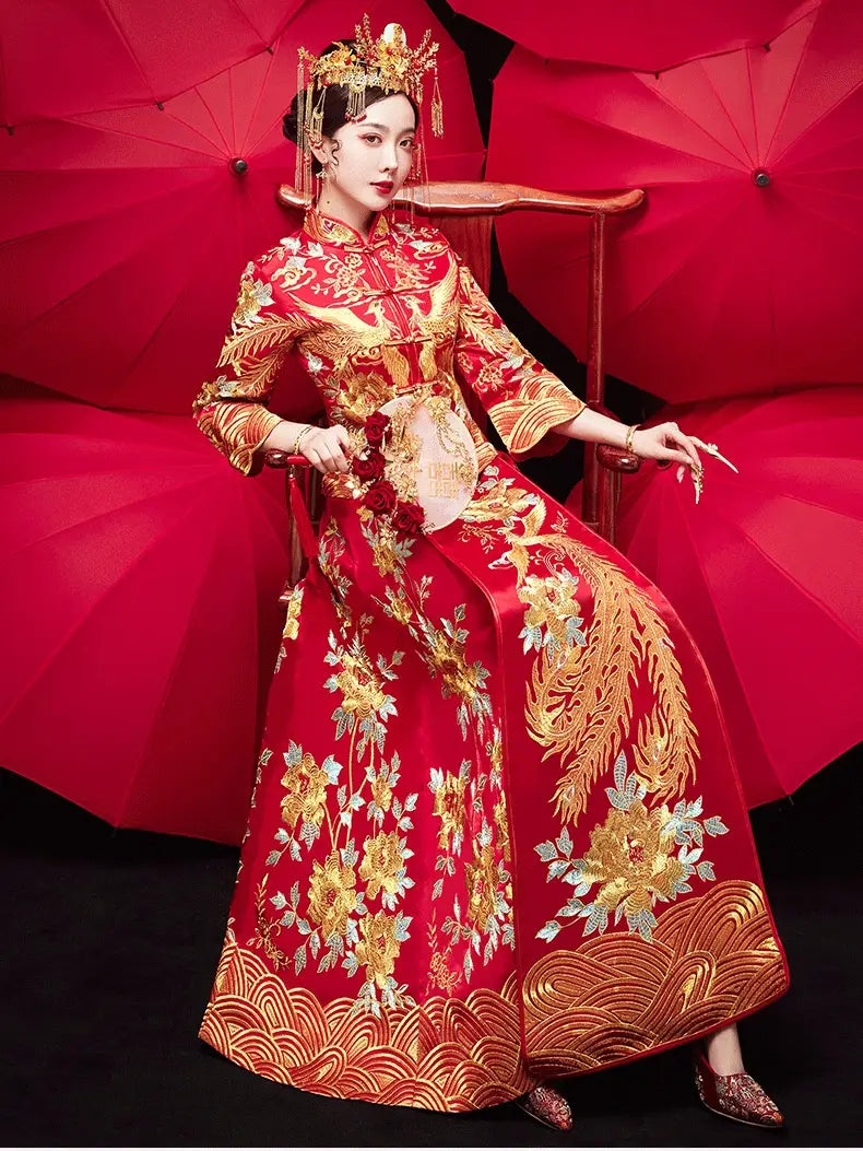 Red and gold embroidered traditional chinese robes xiuhe dress featuring intricate phoenix and floral patterns for official bridal wear with chinese dragon motifs.