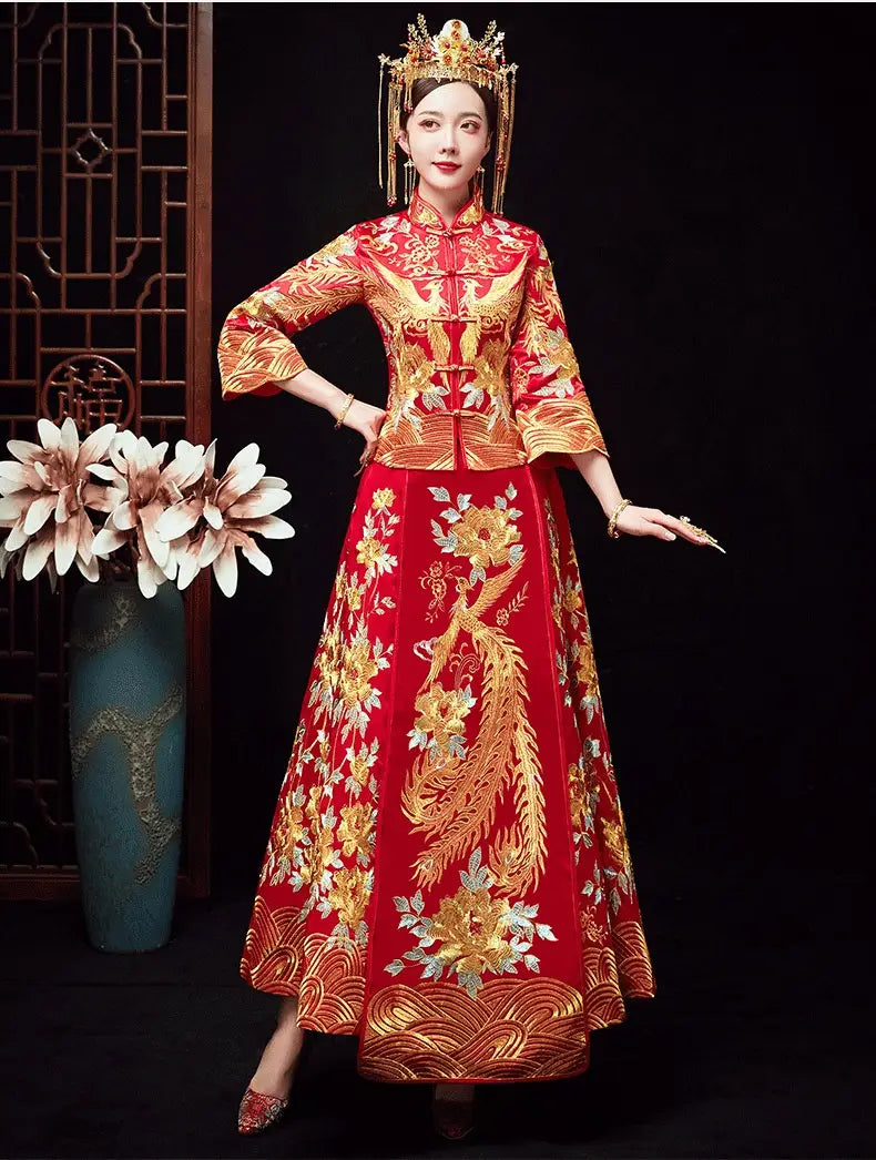 A vibrant red traditional Chinese official robes xiuhe dress featuring intricate golden phoenix and floral embroidery with a fitted bodice and flowing skirt showcasing chinese dragon motifs.