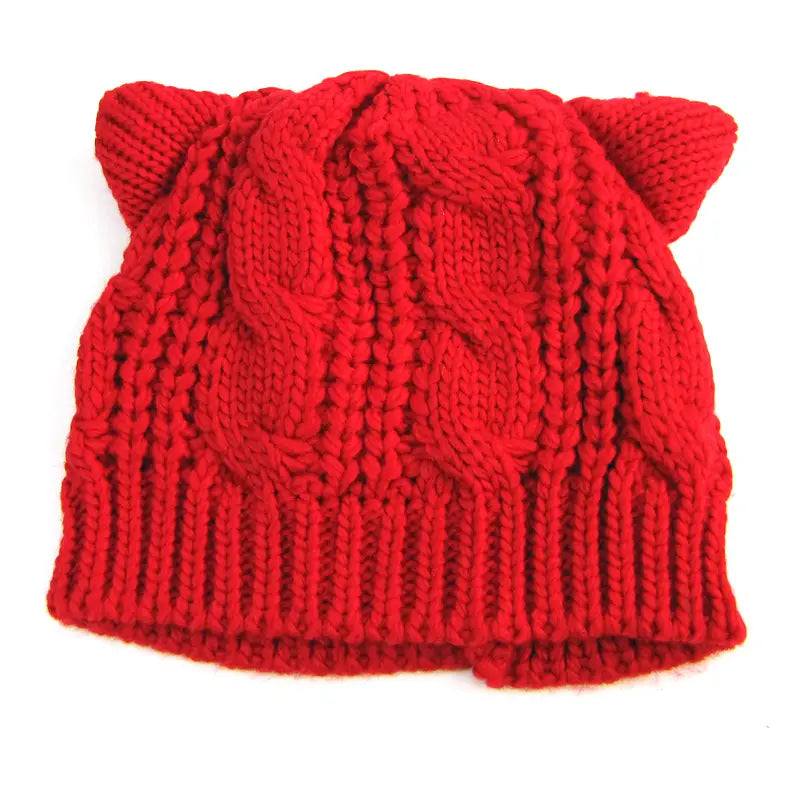 Black textured cute knitted cat ear beanie made 3d cute with a vibrant red knitted cat ear cable knit pattern.
