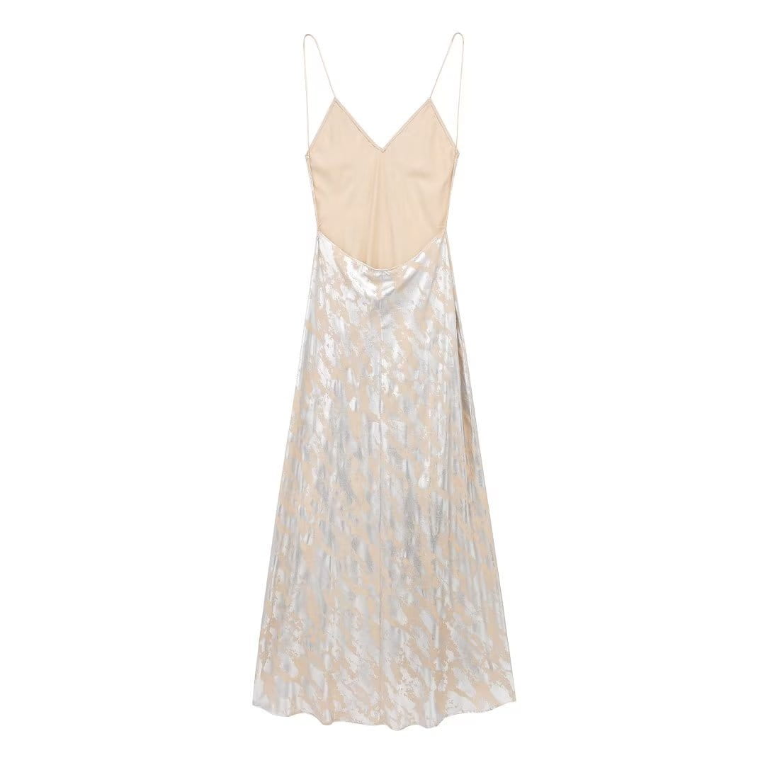 Beige and silver metallic slip dress with thin spaghetti straps featuring metal foil printed satin fabric in a printed underwear dress style.
