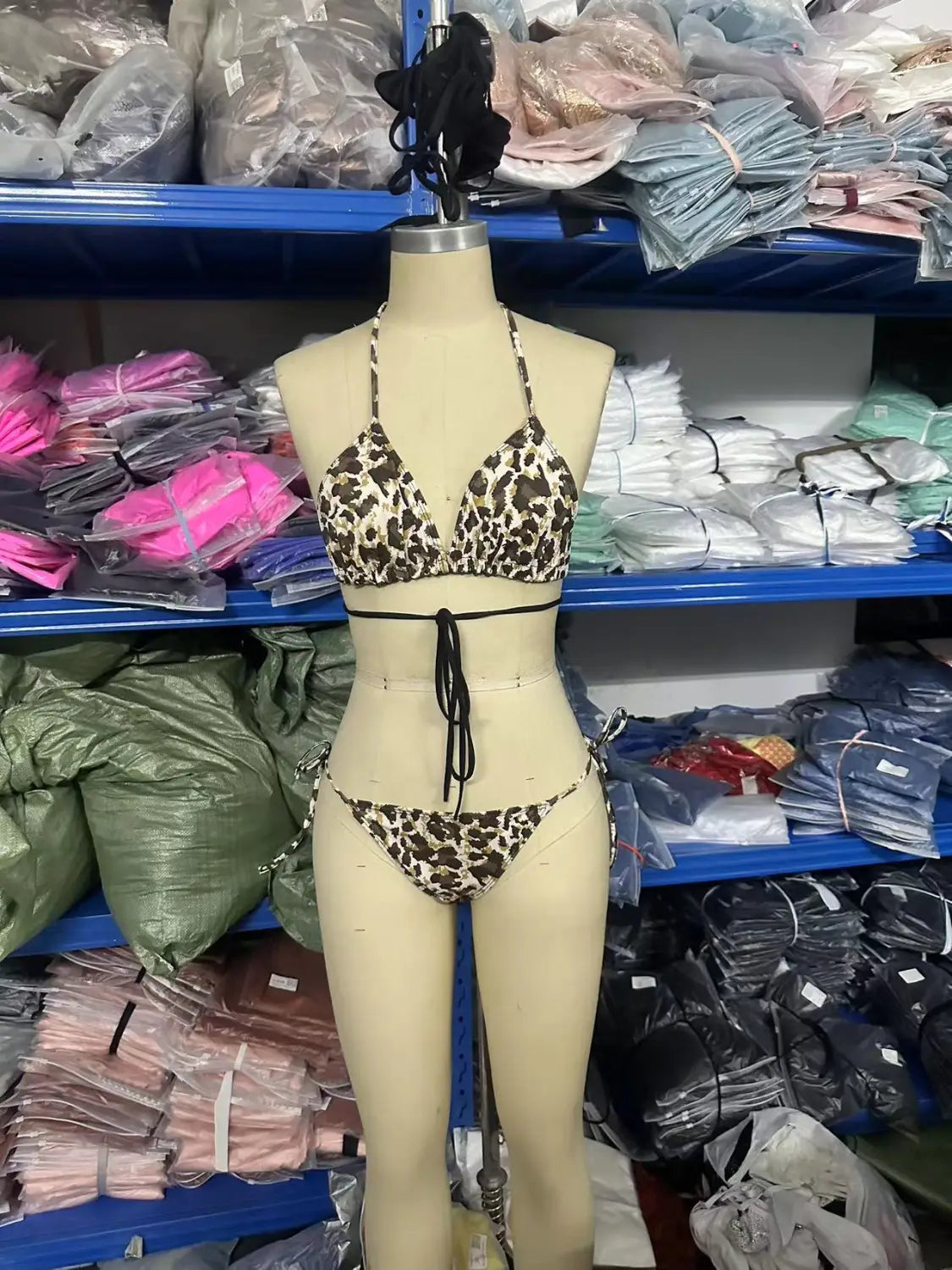 leopard print breathable strap bikini swimsuit set featuring thin straps and a black tie-around waistband designed for comfort and style.
