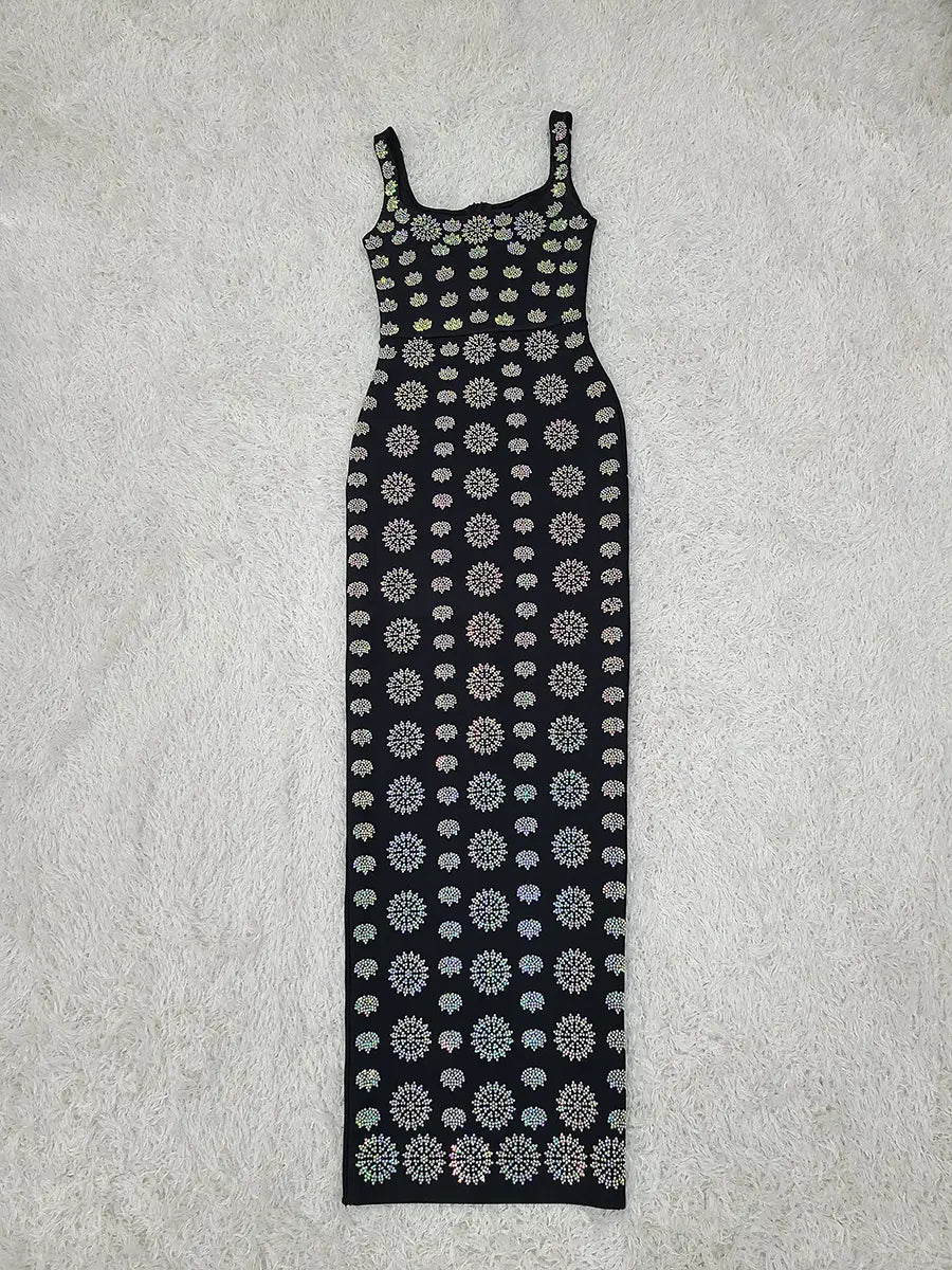 black rhinestone elegant slim bandage evening dress featuring a sleeveless black maxi design with a fitted silhouette and intricate white floral pattern.